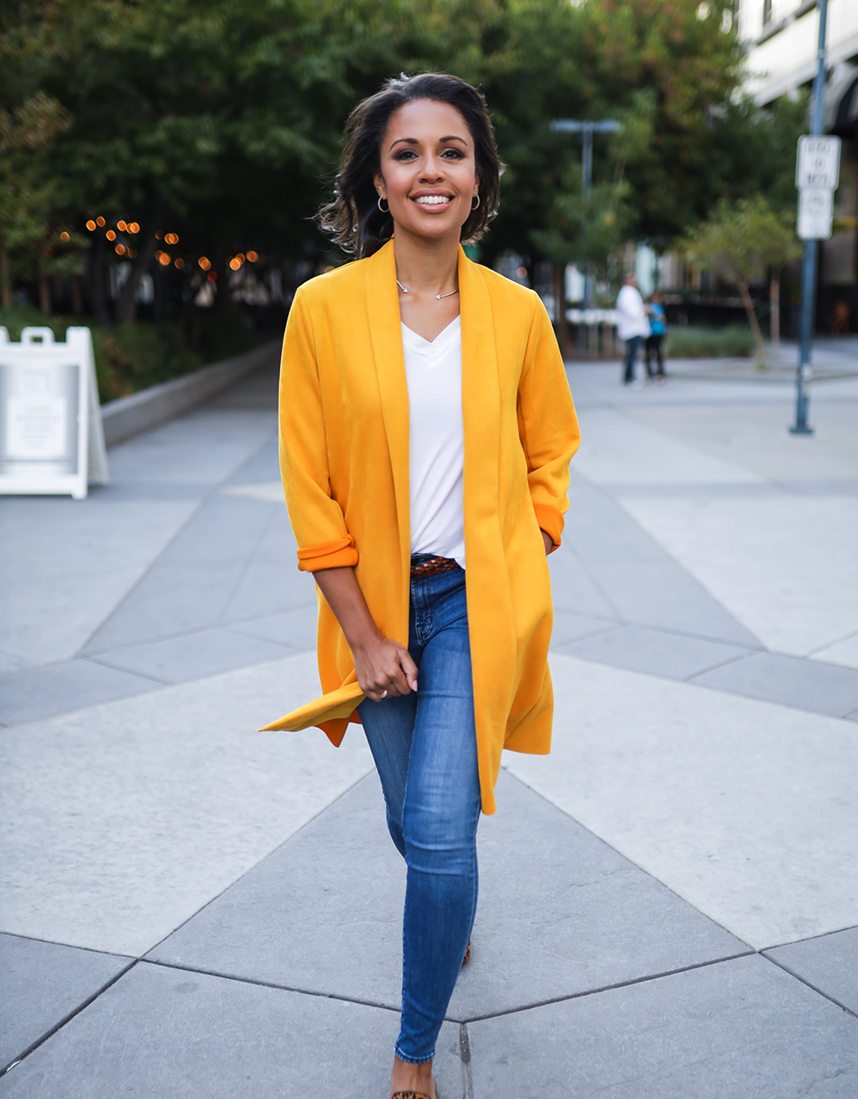 Adrienne Bankert walking through a park